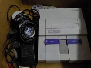 lot 133 image: Super Nintendo and Controls...