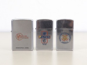 lot 10 image: 3 Vintage Collectible Zippo Advertising Lighters
