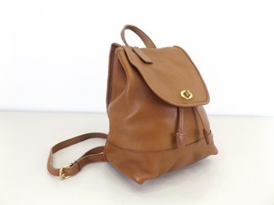 lot 22 image: Authentic COACH English Tan Leather Drawstring Backpack
