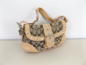 lot 21 image: Authentic COACH Soho Signature Leather and Canvas Hobo Bag