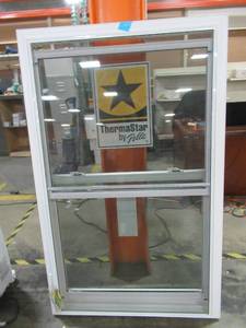lot 203 image: Pella Approximately 58 X 36 X 3 14 ThermaStar Double Hung Window Vinyl Clear Low E Argon Insulated Glass White with Full Screen - Bottom Sash Off Track Needs to be fixed.