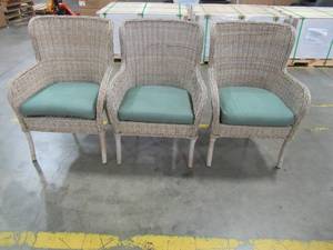 lot 210 image: 3 Hampton Bay Lemon Grove WickerResin Patio Chairs. - One Chair has a leg unraveled