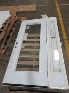 lot 248 image: Masonite 80 X 47 Steel Patio Door with Sidelight, LH Outswing, Double Bore, Prehung (Some of the jamb is missing). Primed, Some scratches.