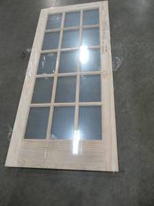 lot 263 image: Reliabilt Solid Pine 15 Lite French Door Slab, 36 X 80 - Slight Chip, Small Piece Cracked Off (see photo).