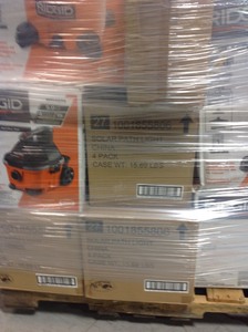 Approx. 6ft tall pallet of Ridgid vacuums solar path light and more
