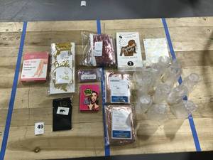 lot 49 image: Mixed Lot of Bachelorette Party  Bridal Shower Party  Girls Night Mixed lot includes 20 items champange glasses, sunglasses, dcor, party favors, games, spa items, balloons