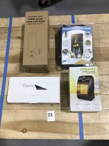 lot 73 image: Mixed Lot of 4-Technical Details Dimmable Touch Table Lamp, Flux Phenom Magnetic Screen Door, Fitmaker Electric PTC Heater 1500W, Davinci Lighting DL105 4x4 Solar Post Cap Lights