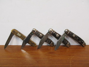 lot 57 image: Nice Group of 4 Vintage BoneStag Handle Pocket Knives