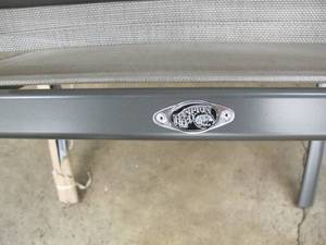 lot S29 image: Hampton Bay Commercial Grade Aluminum Light Gray Stackable Outdoor Patio Dining Chair in Sunbrella Augustine Alloy Sling - Damaged