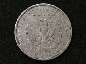 lot 21 image: 1885 Morgan Silver Dollar...