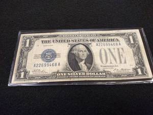 lot 161 image: 1928 Funny Back One Dollar Silver C...