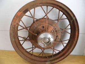 lot 62 image: Antique Car Wheel
