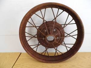 lot 64 image: Antique Car Wheel