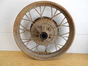 lot 65 image: Antique Car Wheel