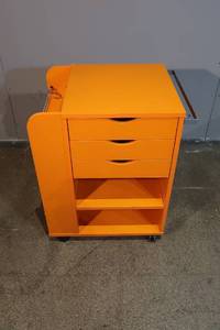 lot 20 image: Orange Rolling Storage Cabinet