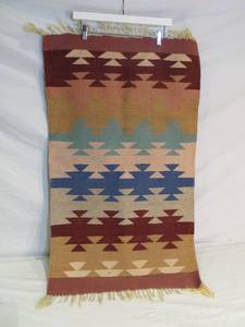 lot 66 image: Woven Rug