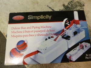 lot 47 image: New Simplicity Deluxe Bias and Piping Machine