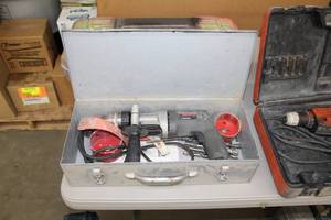 lot 56 image: Black&Decker Industrial Heavy Duty Screamer 12in. VSR Hammer Drill 5072, Metal Case, Drill Bits
