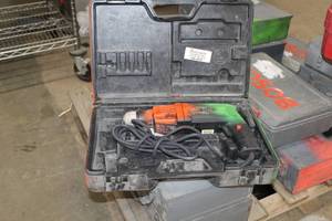 lot 60 image: Chicago Pneumatic 34in. Rev. Hammer PHE 20 RL-N, Case
