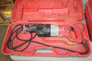 lot 66 image: Milwaukee Sawzall, Case, Spare Blades