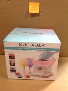 lot 36 image: Pink Cotton Candy Machine with 2 Cotton Candy Cones by Nostalgiaopen box in like new condition