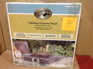 lot 71 image: Hampton Bay 8,000BTU Antique Bronze Portable Table Top Gas Fire Pitopen box in like new condition
