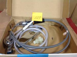 lot 127 image: MOEN Adler Single-Handle Low Arc Standard Kitchen Faucet with Side Sprayer in Chrome in good condition