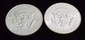 lot 39 image: 2 AU-UNC 1964 KENNEDY SILVER HALF DOLLARS
