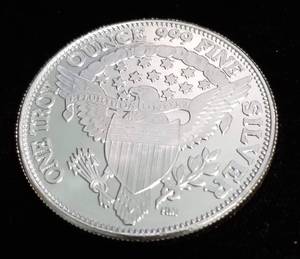 lot 54 image: 1 TROY OZ. .999 FINE SILVER 1964 KENNEDY DESIGN