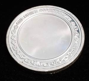 lot 60 image: 1 TROY OZ. .999 FINE SILVER EAGLE ON SHIELD DESIGN