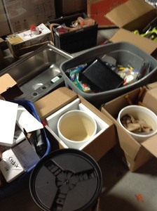 lot 5 image: Mix of Leonor locks  wall bridge cabinet  accent table  electric fire place  lawnmower  pots and much more.