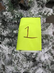 Artificial Tree in green with fake snow covering, roughly 8 feet tall by Vickerman