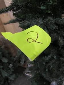 Artificial LED Tree in green, roughly 8 feet tall by Vickerman