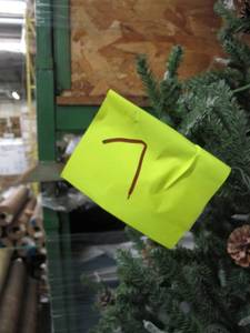 Artificial LED Tree in green, roughly 7.5 feet tall by Vickerman