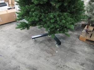 Artificial Tree in green, roughly 12 feet tall by Vickerman - On Wheeled Base