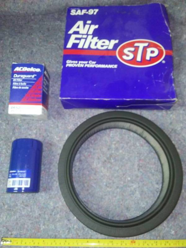 lot 30 image: NEW AC Delco Oil Filter and STP SAF-97 Air filter and more