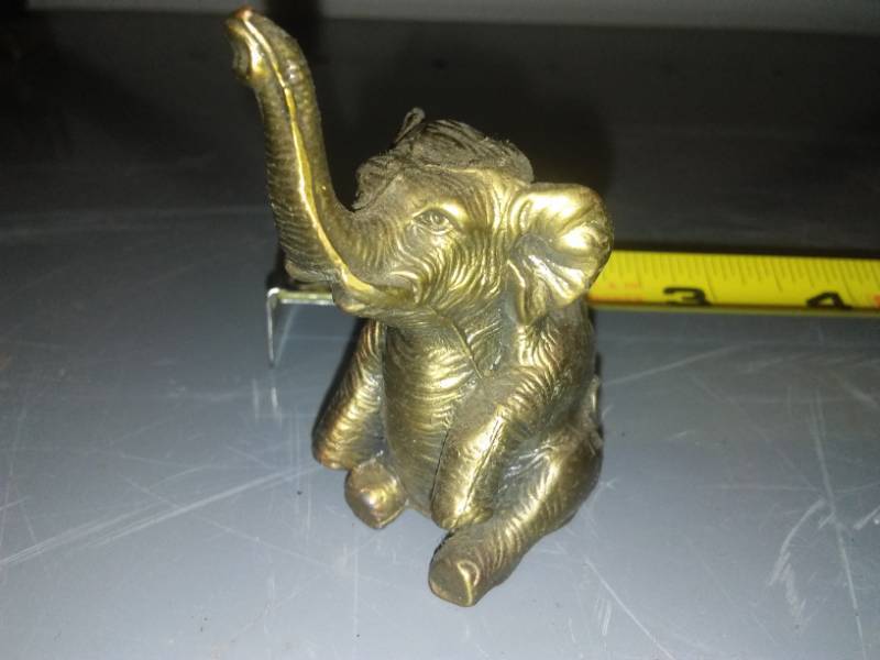 lot 56 image: 2 brass elephants.