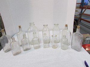 lot 45 image: Vintage Clear Glass Bottles