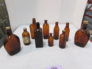 lot 46 image: Vintage Brown Glass Bottles