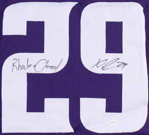 lot 13 image: Xavier Rhodes Signed Vikings Purple Jersey Inscribed Rhodes Closed (TSE COA)