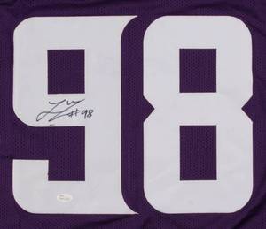 lot 20 image: Linval Joseph Signed Vikings Purple Jersey (JSA Hologram)