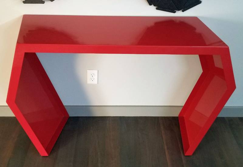 red metal console table