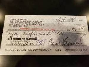 lot 52 image: Framed Cancelled Checks from Elizabeth Montgomery and Carol Burnette