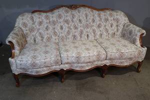 lot 16 image: Tufted Sofa with Wood Trim