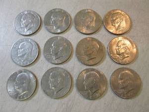 lot 106 image: 12 Ike Silver Dollars  CNTR...