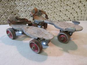 lot 24 image: Vintage Pair of All Metal Roller Sk...