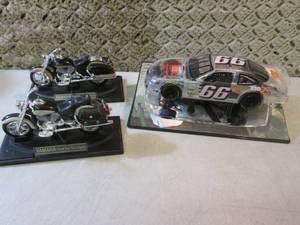 lot 135 image: Race Car on Display Base and 2 Moto...