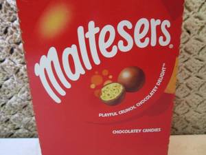 lot 201 image: Box of 18 Bags of Maltesers Candy B...