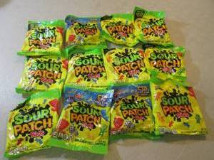 lot 239 image: 12 Bags of Sour Patch Kids Candy Be...