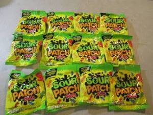 lot 253 image: 12 Bags of Sour Patch Kids Candy Be...
